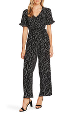 CeCe Sportswear Women's Short Sleeve V-Neck Ditsy Etching Belted Jumpsuit, Rich Black, 14