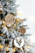 Wooden Hanging Circle With Snowflake Cut Christmas Ornaments (Set of 12)