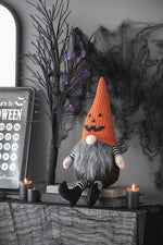 23.5" Seated Jack-O'-Lantern Gnome With Striped Limbs and Faux Fur Beard